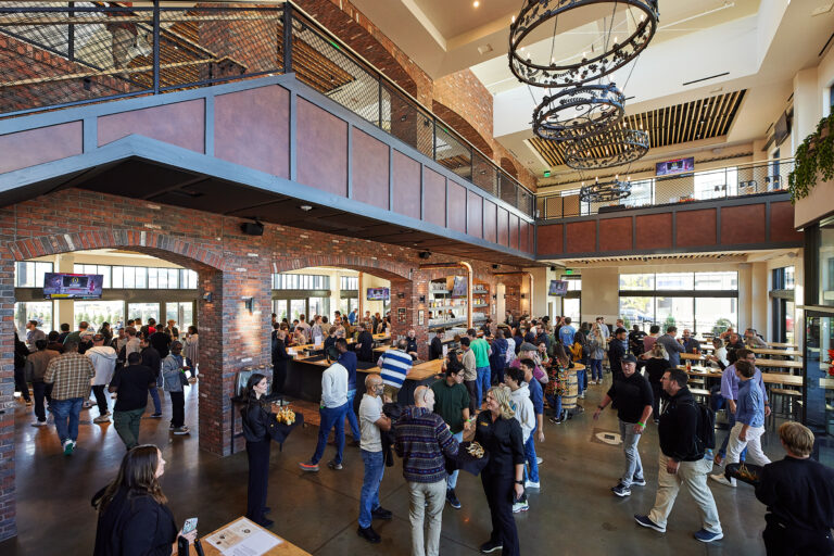 community coming together in a large gathering space